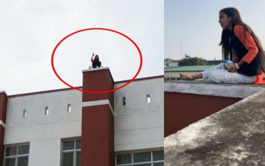 rashmi lamgariya climbs up on college rooftop